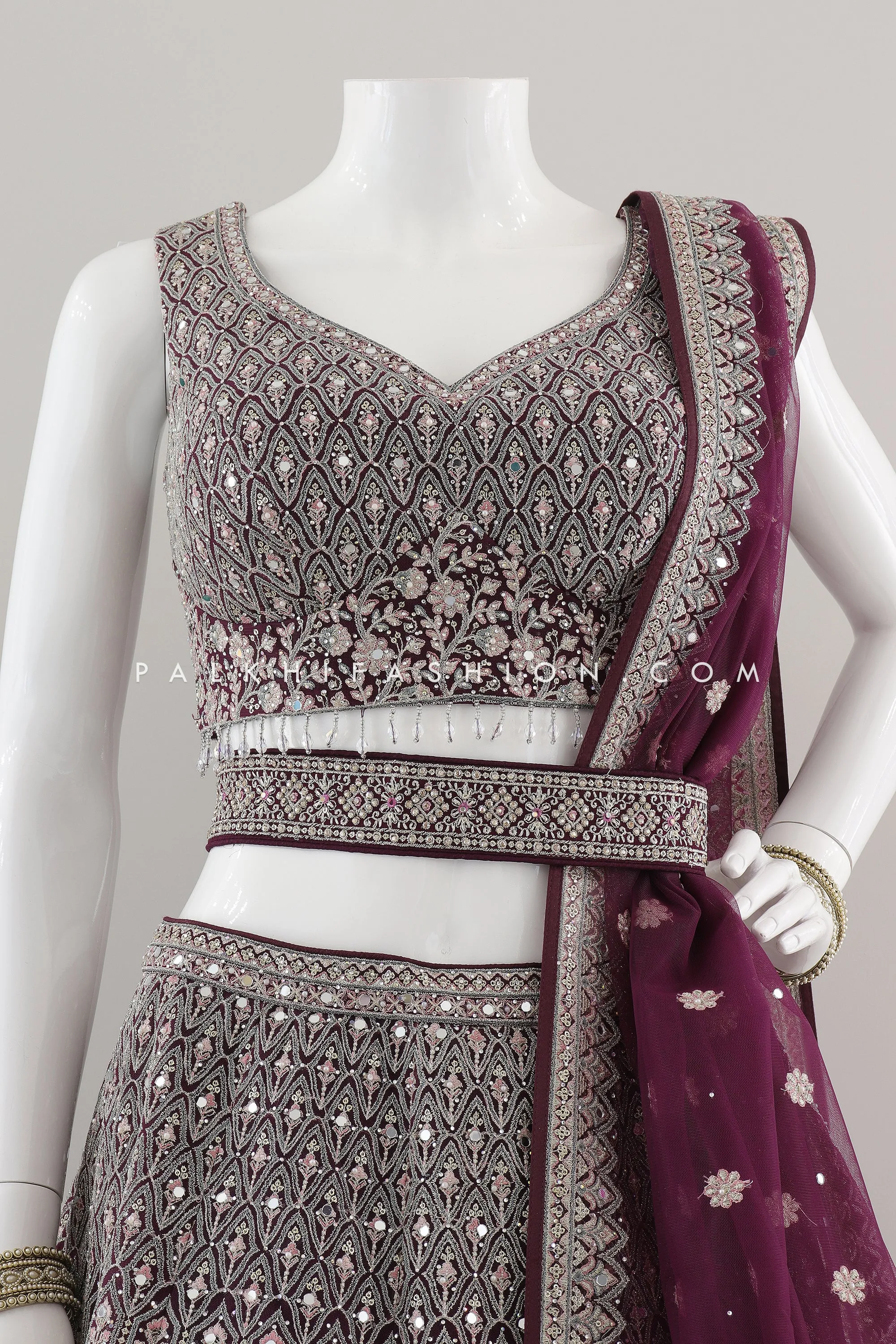 Regal Radiance: Designer Wine Lehenga Choli with Handwork