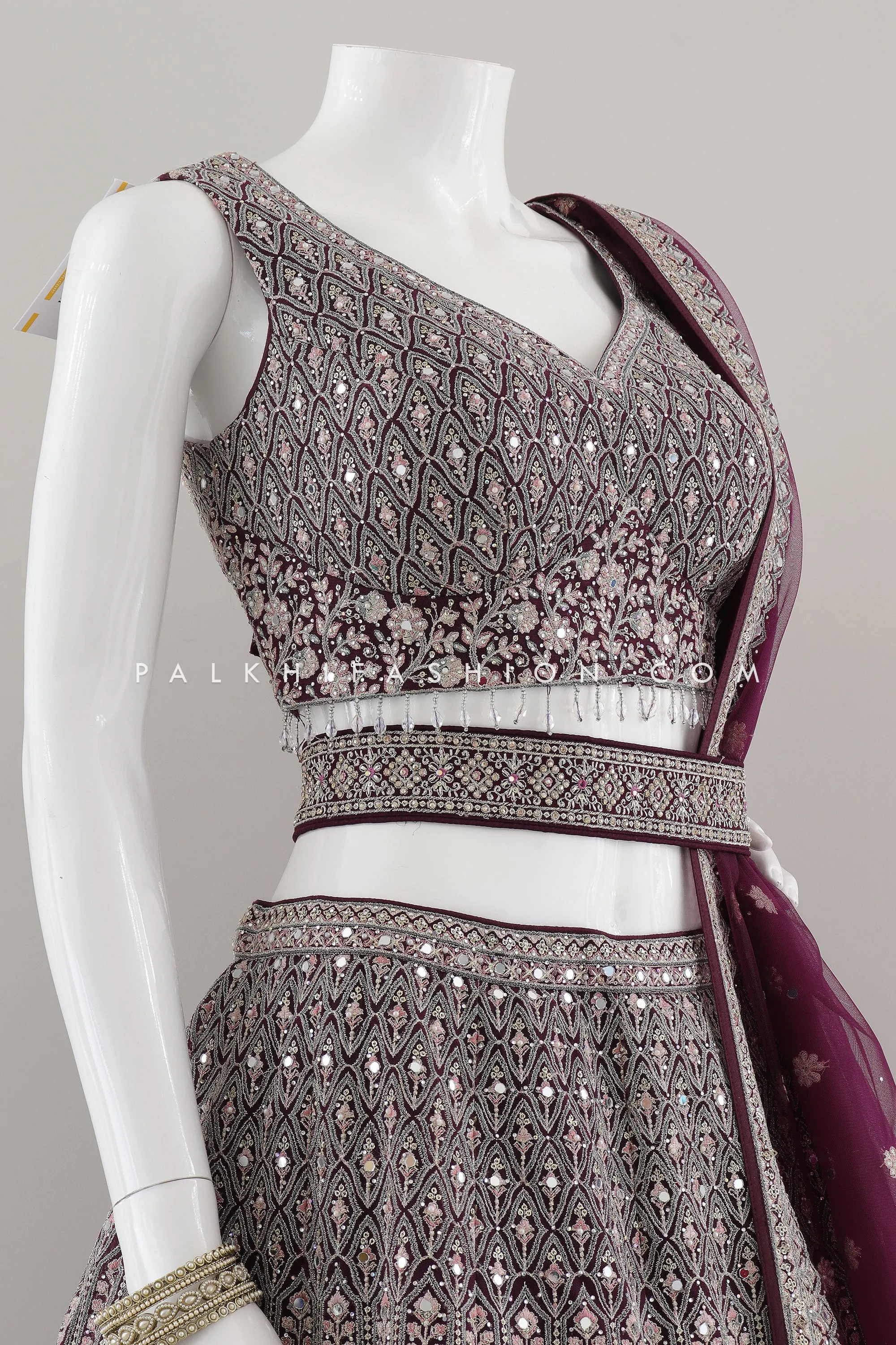 Regal Radiance: Designer Wine Lehenga Choli with Handwork