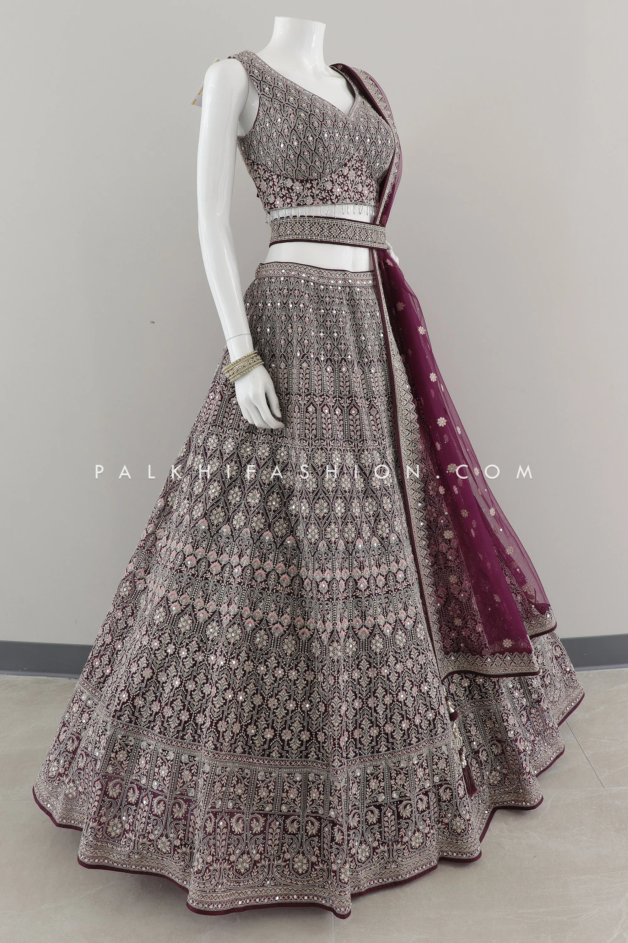 Regal Radiance: Designer Wine Lehenga Choli with Handwork